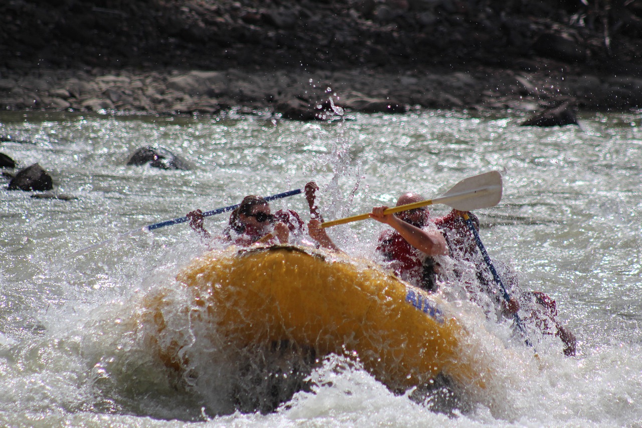 A group enjoying a thrilling whitewater rafting adventure on a rushing river